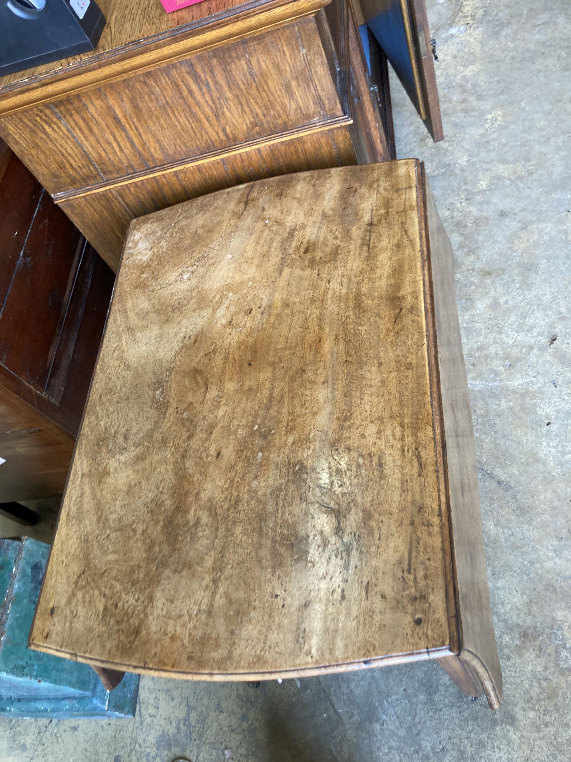 A George III mahogany Pembroke table, with serpentine shaped top, single drawer, on square section supports, width 76cm, depth 52cm, he